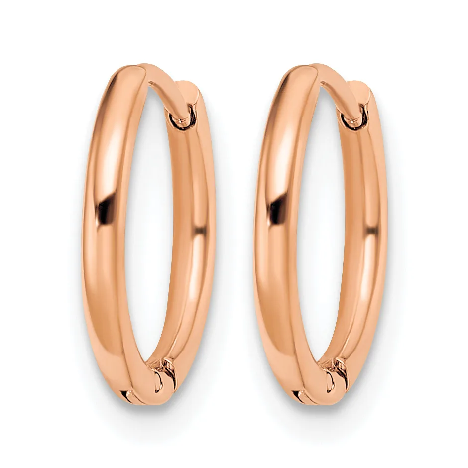 A pair of polished rose gold hoop earrings with a smooth, rounded profile and hinged closures, displayed against a white background.