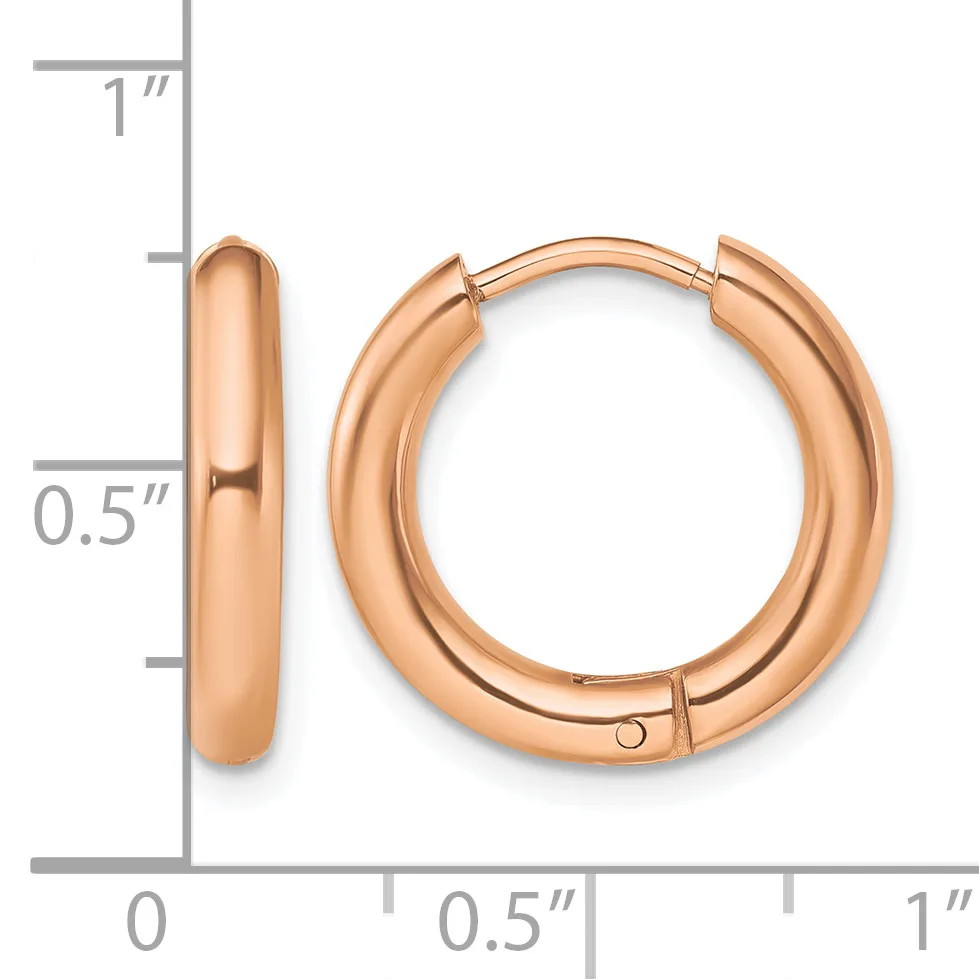 Pair of rose gold polished chunky hoop earrings with hinged closures, shown against a ruler indicating approximately one inch in diameter and half inch in width.