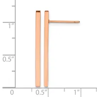 Two rose gold rectangular bar stud earrings displayed next to a ruler showing approximately one inch in length.