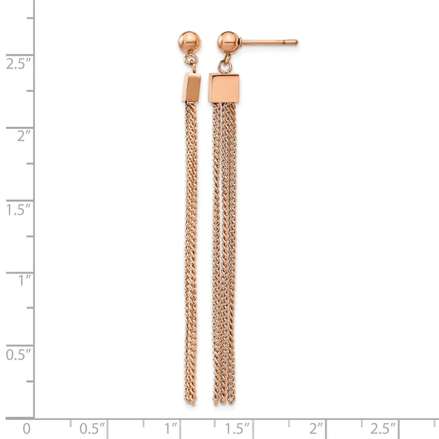 Pair of rose gold drop earrings with small ball studs and long chain tassels with square connectors, displayed on a measurement ruler.