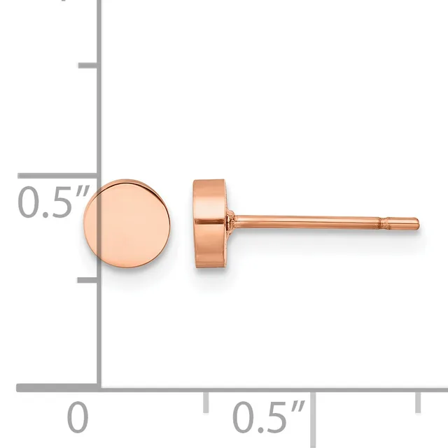 A pair of rose gold circular stud earrings displayed against a measurement ruler showing approximately 0.5 inch diameter.