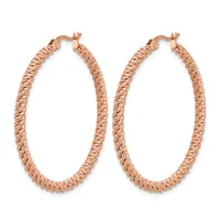 A pair of rose gold textured hoop earrings with twisted diamond-cut pattern and hinged closures, displayed against a white background.