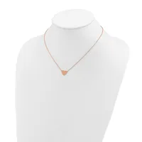 Rose gold necklace with a small heart pendant displayed on a white mannequin bust.