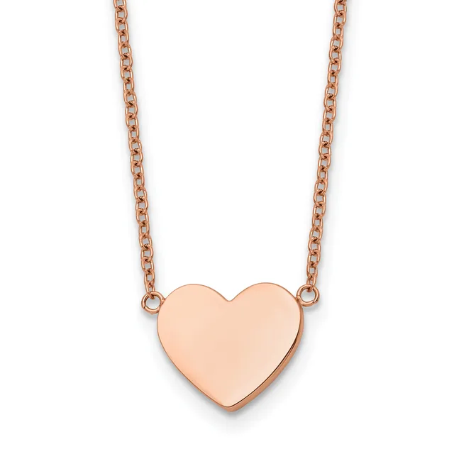 Rose gold heart pendant necklace with chain on white background.