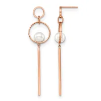 Rose gold dangle earrings with small circular studs at top, larger circular frames holding white pearls, and long rectangular bar drops below.