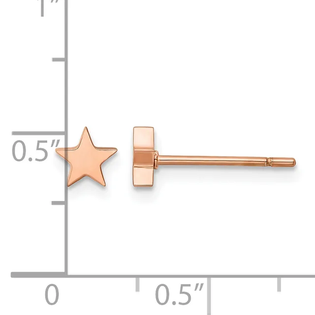 Rose gold star stud earrings displayed on a measurement scale showing approximately 0.5 inches in width.