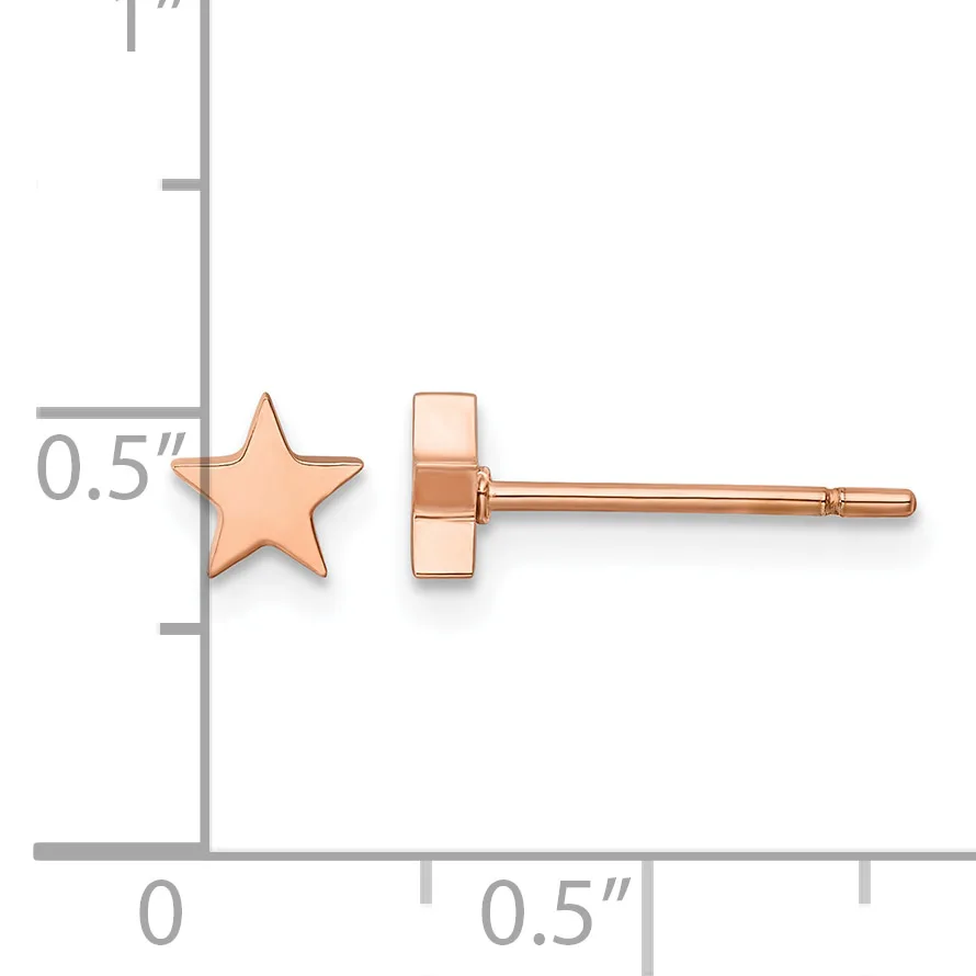 Rose gold star stud earrings displayed on a measurement scale showing approximately 0.5 inches in width.