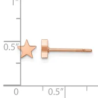 Rose gold star stud earrings displayed on a measurement scale showing approximately 0.5 inches in width.