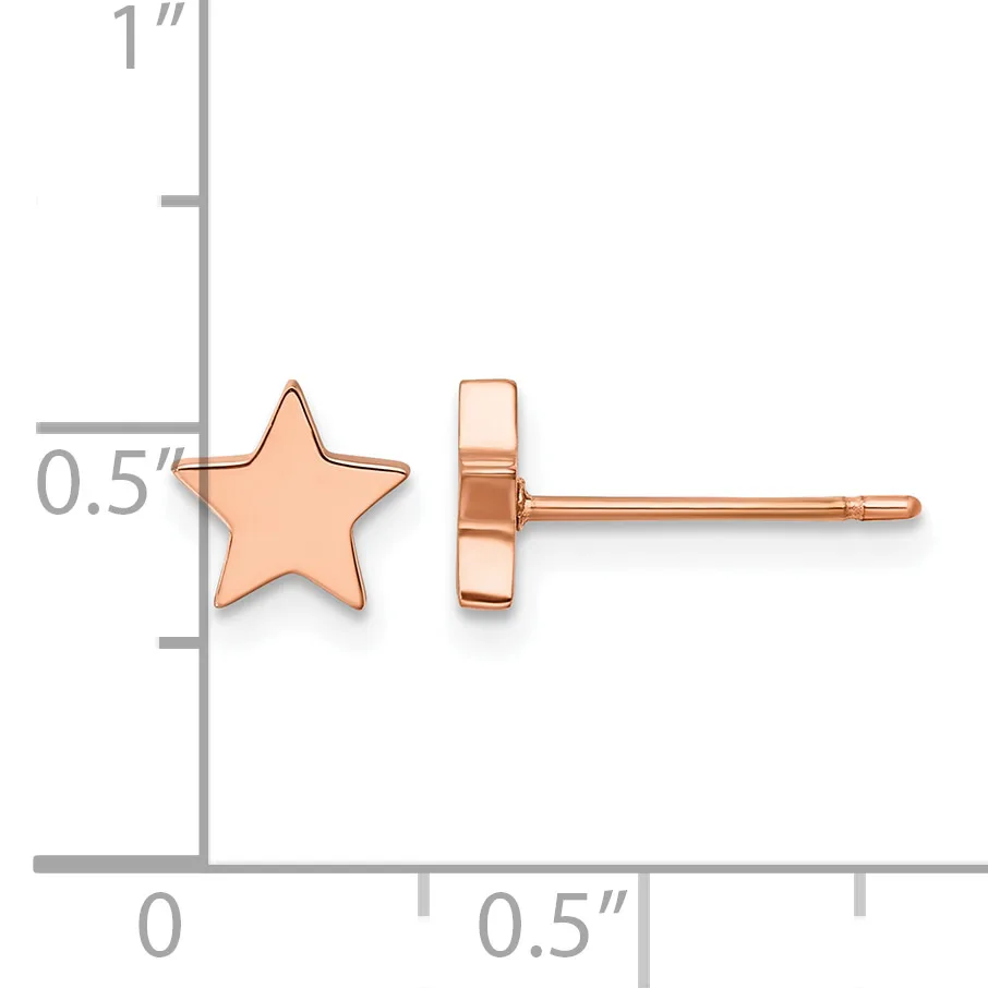 A pair of rose gold star-shaped stud earrings displayed next to a measurement ruler showing approximately 0.5 inches in width.