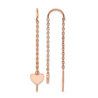 Pair of rose gold threader earrings with delicate chain strands, one featuring a polished heart charm pendant.