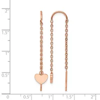 Rose gold threader earrings with delicate chain and a small heart charm, displayed against a measurement ruler showing approximately two inches in length.