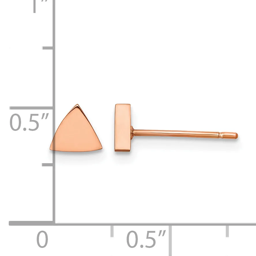 A pair of rose gold stud earrings shown next to a measurement scale, featuring a triangular polished front and a rectangular post backing.