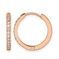 A pair of rose gold hoop earrings with round diamond accents set along the outer surface, shown from the front view.