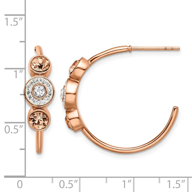 Rose gold hoop earrings with three bezel-set stones—two champagne-colored round stones flanking a center diamond—displayed against a measurement scale.