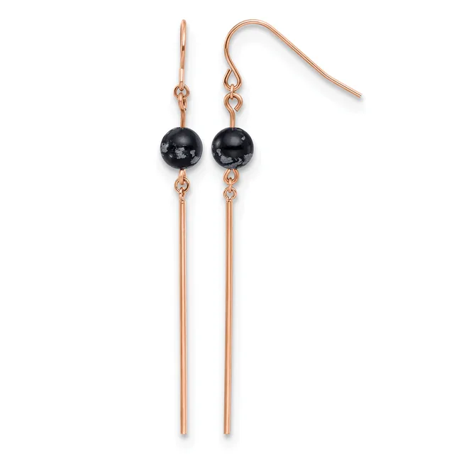 Pair of rose gold dangle earrings with black spherical stones and long thin metal rods, displayed against a white background.