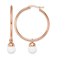 Rose gold hoop earrings with white pearl drops, shown as a pair with posts and backs visible.