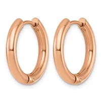A pair of polished rose gold hoop earrings with a chunky, rounded profile and hinged closure, shown side by side against a white background.