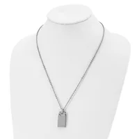 A silver-toned metal necklace with a delicate chain and a rectangular pendant displayed on a white mannequin bust.