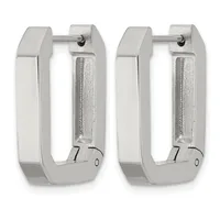 A pair of silver-toned rectangular hoop earrings with textured inner surfaces and polished outer edges, shown from the front and back.