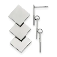 Silver earrings with three square white stone drops on the left and a pair of matching square white stone drop earrings on elongated posts on the right.