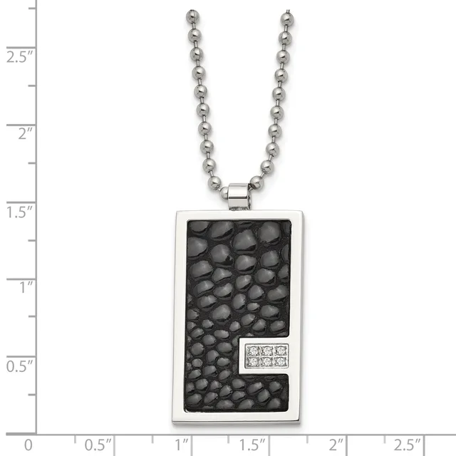 Stainless steel pendant necklace with ball chain, featuring a rectangular pendant with black leather texture and small diamond accents, displayed against a measurement scale.
