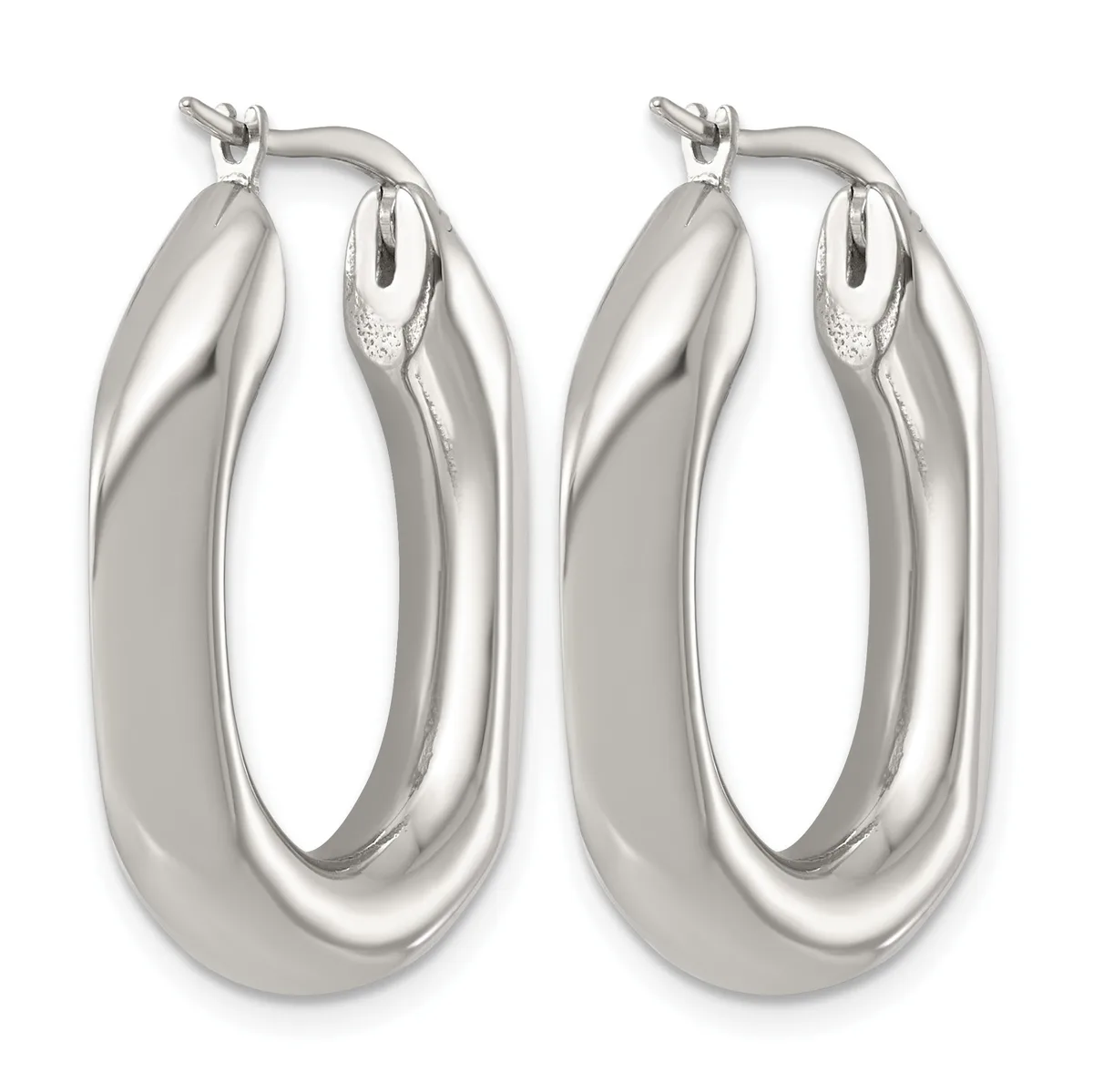 A pair of polished silver oval hoop earrings with a smooth, curved surface and hinged closures, shown from the front.