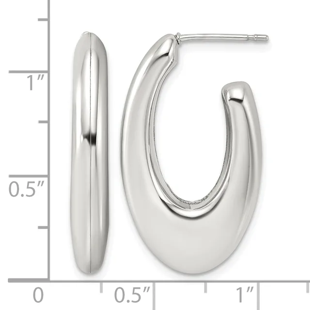 Polished silver-toned oval hoop earrings with post and back closures, shown next to a measurement ruler indicating approximately one inch in length.