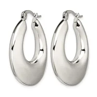 A pair of polished silver-toned oval hoop earrings with a smooth, curved surface and post-and-clutch closures, displayed side by side.