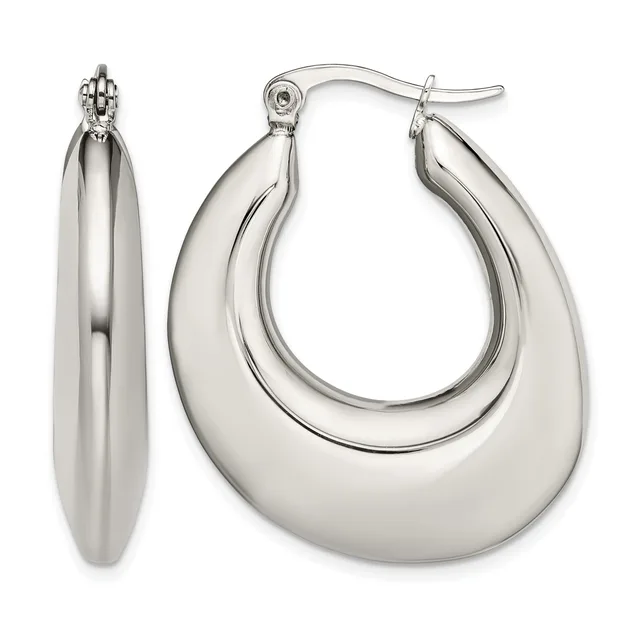 A pair of polished silver-toned chunky curved hoop earrings shown from front and side views with post and clutch closures.