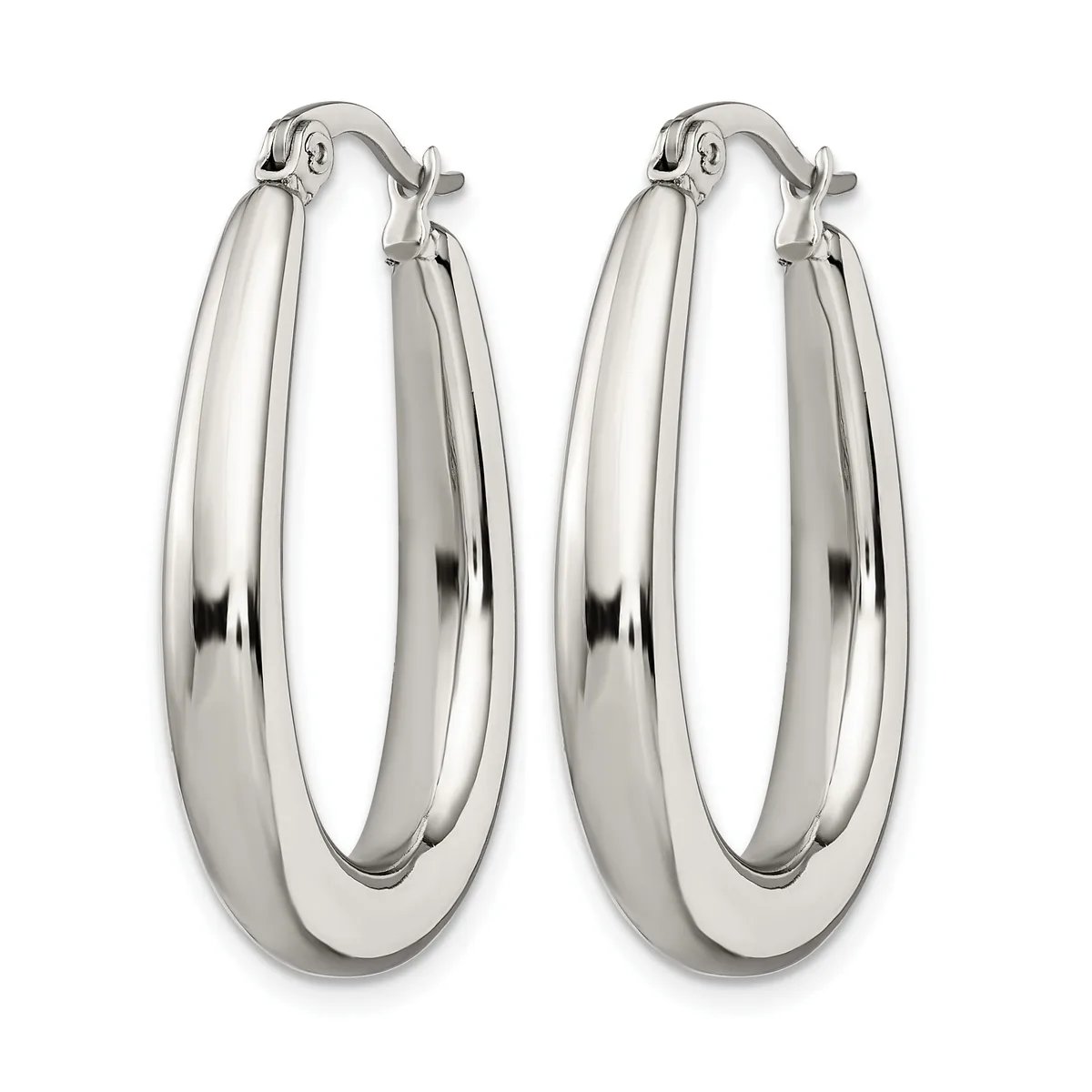 A pair of polished silver-toned oval hoop earrings with a chunky, rounded profile and hinged closures, displayed side by side.