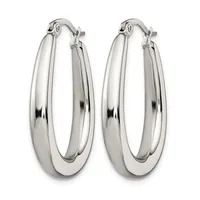 A pair of polished silver-toned oval hoop earrings with a chunky, rounded profile and hinged closures, displayed side by side.