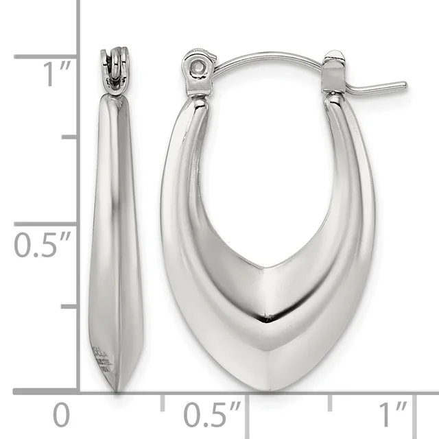 Polished silver-toned oval hoop earrings with a tapered design, displayed against a measurement scale showing approximately one inch in length.