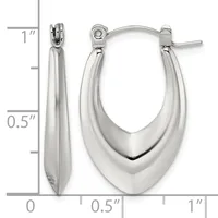 Polished silver-toned oval hoop earrings with a tapered design, displayed against a measurement scale showing approximately one inch in length.