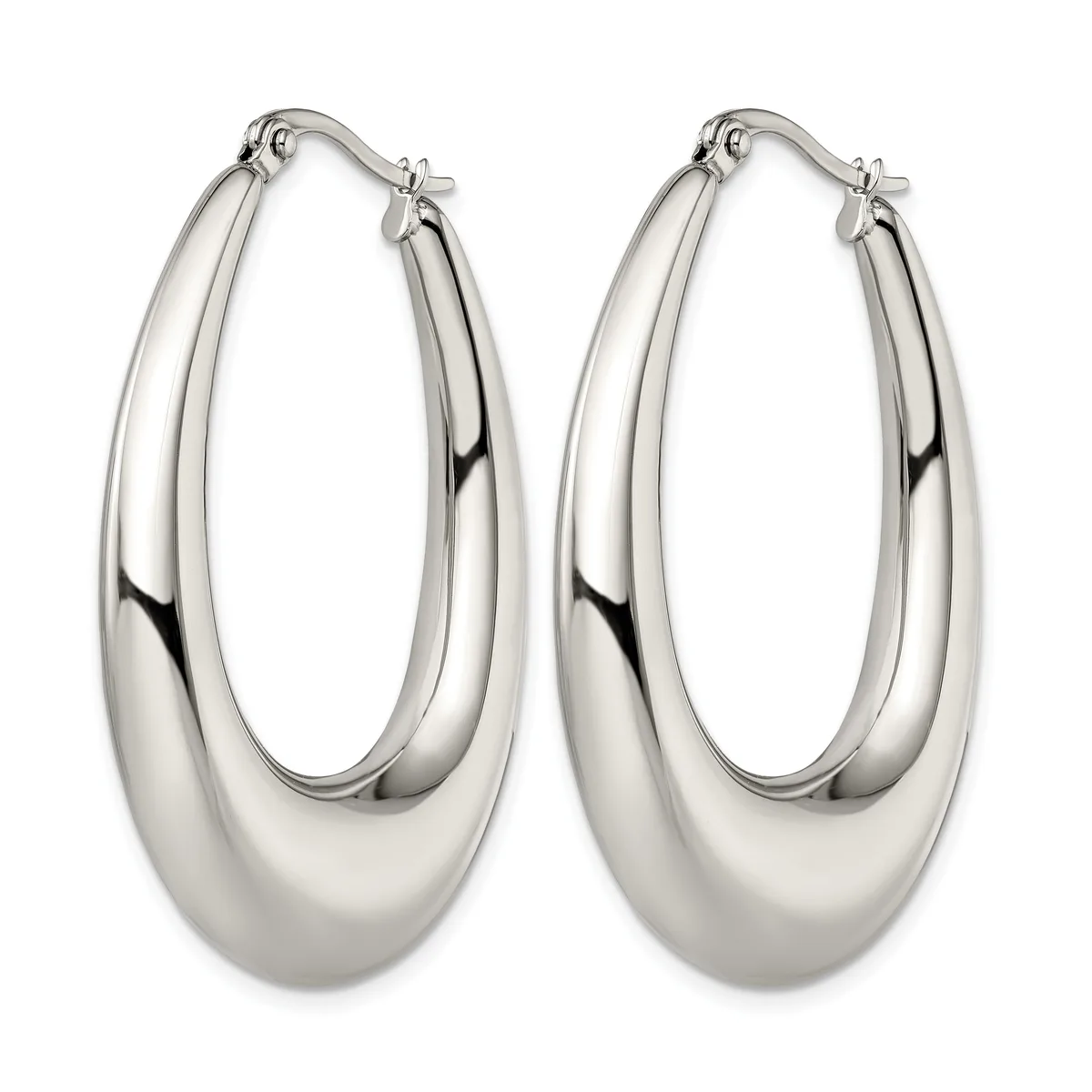 A pair of polished silver oval hoop earrings with a smooth, rounded surface and hinged closures, displayed against a white background.