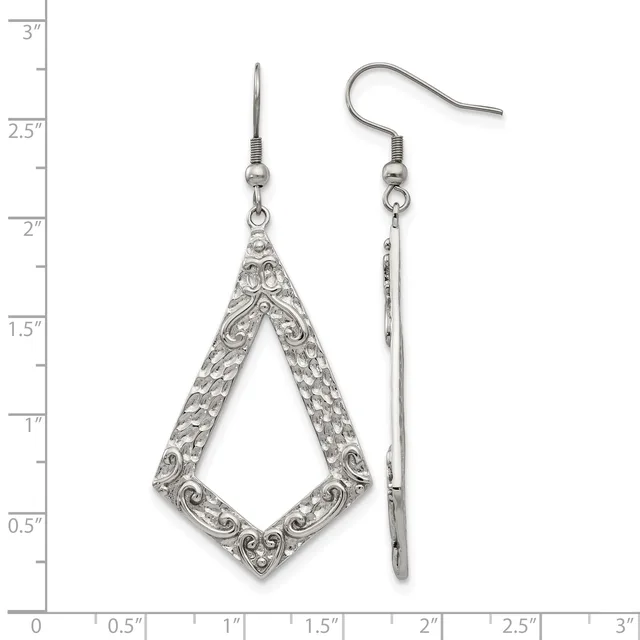 A pair of silver-tone ornate teardrop-shaped dangle earrings with decorative filigree detailing, shown front and side view against a measurement ruler.