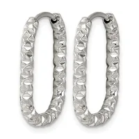 Pair of silver oval hoop earrings with a textured hammered surface finish and hinged closures.
