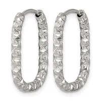 Pair of silver oval hoop earrings with a textured, hammered surface finish and hinged closures.