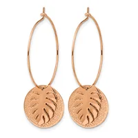 Pair of rose gold hoop earrings with circular leaf-motif pendants hanging from oval wire loops.