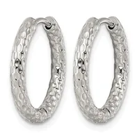 A pair of silver hoop earrings with a textured, dimpled surface finish and hinged posts with small loop closures.