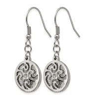 Pair of silver-toned fish hook earrings with ornate oval medallion pendants featuring detailed swirling relief designs.