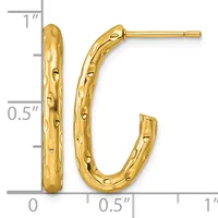 Pair of gold textured hoop earrings with a hammered surface pattern, shown next to a ruler measuring approximately one inch in length.