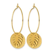 Pair of gold-toned hoop earrings with circular leaf-patterned pendants hanging from elongated oval loops.