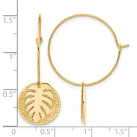 Gold-toned hoop earrings with circular leaf-motif charms hanging from the wires, displayed next to a measurement scale.