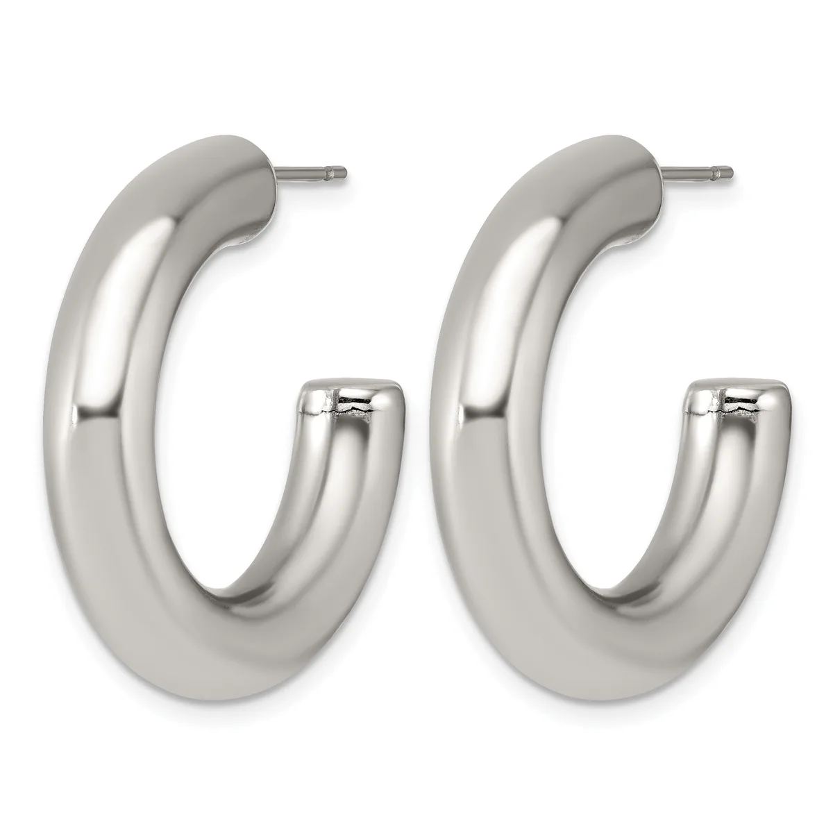 Pair of polished silver-toned chunky curved hoop earrings with post and backing closures, shown against a white background.