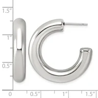 Polished silver-toned chunky curved hoop earrings displayed against a measurement scale showing approximately 1.5 inches in height and 0.5 inches in width.