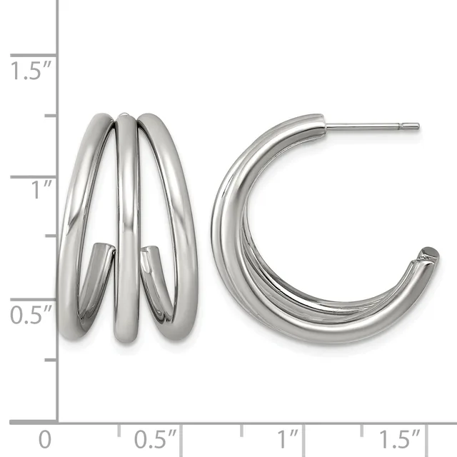 Two polished silver hoop earrings displayed next to a measurement scale, one with triple stacked tubes and one with smooth curved bands.