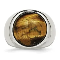 A polished silver ring with a large rounded rectangular face set with a smoky amber-colored stone, displayed against a white background.