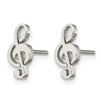 Pair of silver treble clef stud earrings with textured surfaces and surgical steel posts, shown from the front.