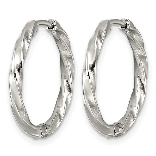 Pair of twisted silver hoop earrings with a textured finish and hinged closures, shown against a white background.
