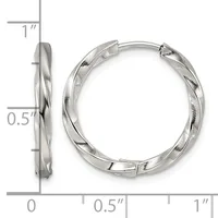 Silver twisted hoop earrings with hinged closures, shown from front and side views with measurement scale indicating approximately one inch in diameter and half inch in width.
